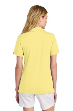 TravisMathew Ladies Glenview Solid Polo 25 TravisMathew Ladies Glenview Solid Polo -Thread Logic Store TM1LF071 paleyellow model back